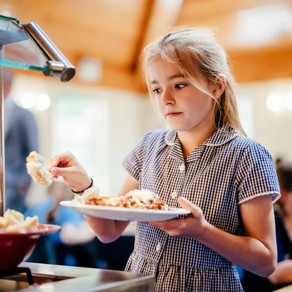 Prep pupil having lunch