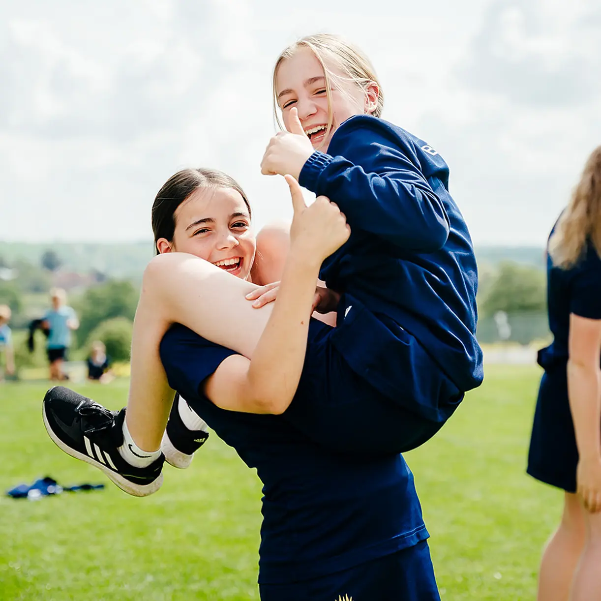 Prep school girls playing outdoors