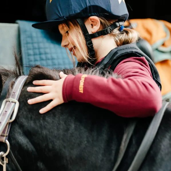 Equestrian pony with prep school girl