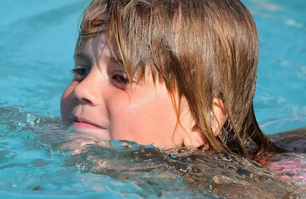 Child in swimming lesson