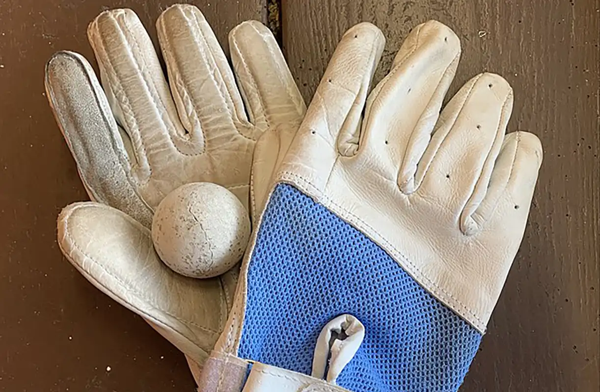 Fives (Photo credit - https://en.m.wikipedia.org/wiki/File:Fives_Gloves_and_Ball.jpg)