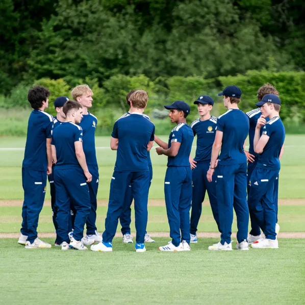 Cricket huddle after wicket