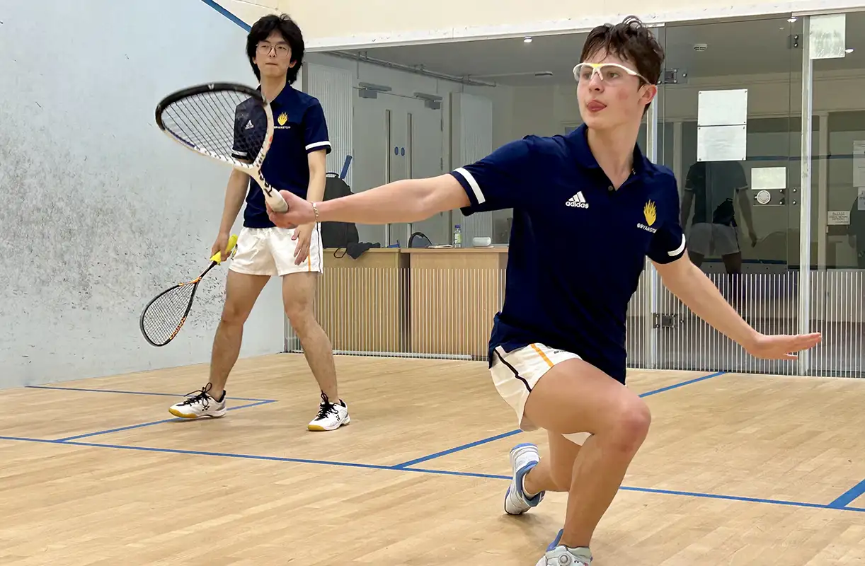 Squash with two boys